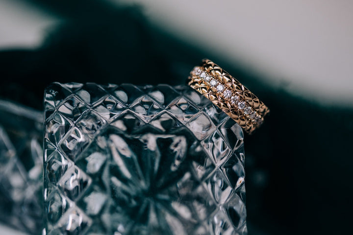 Quilts eternity ring with diamonds in the center - Oz's Jewelers by The Hickory Jewelry Company